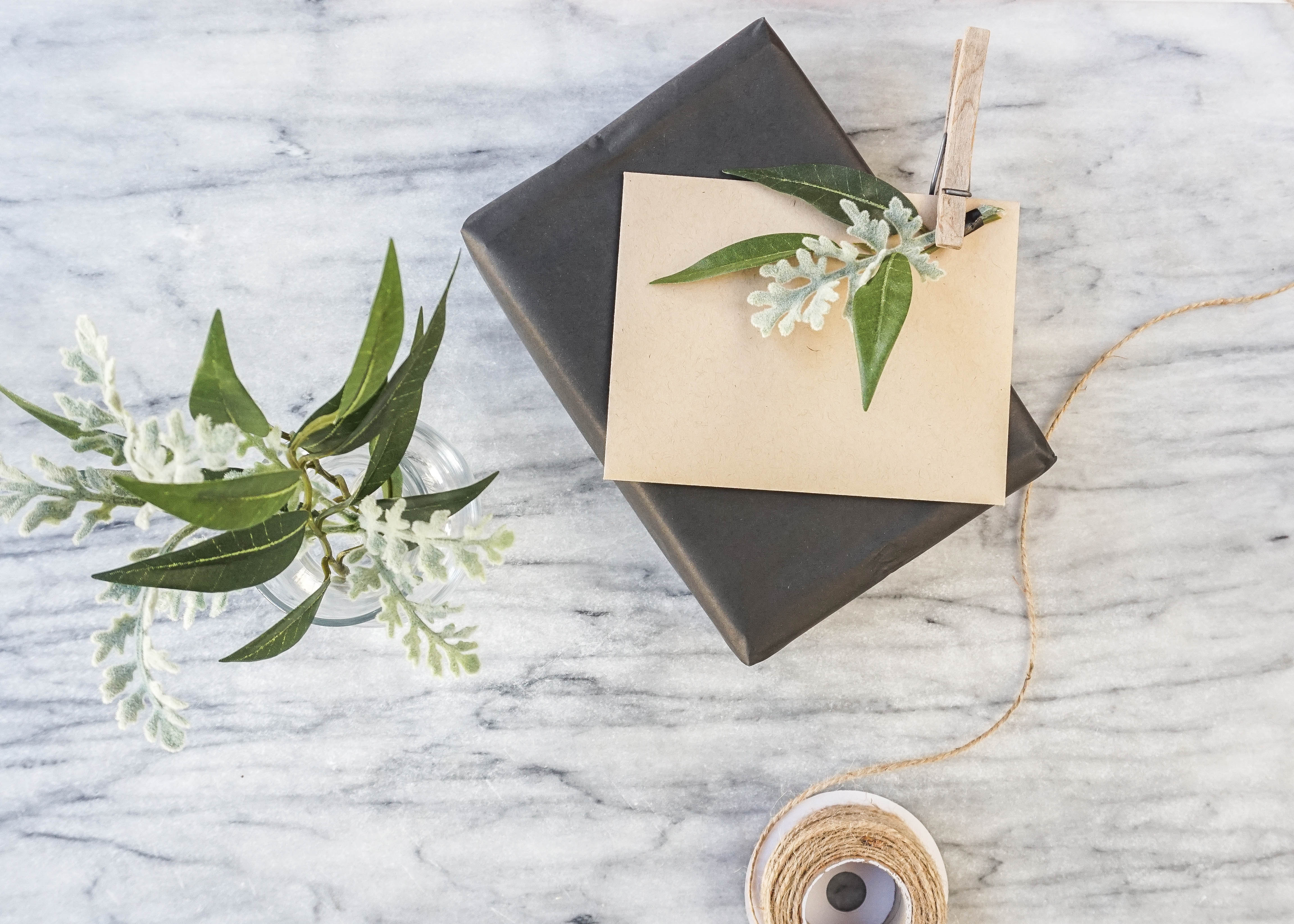 a simple gift decorated with a flower.