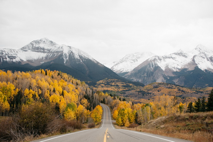 Road leading to fall mountain scene